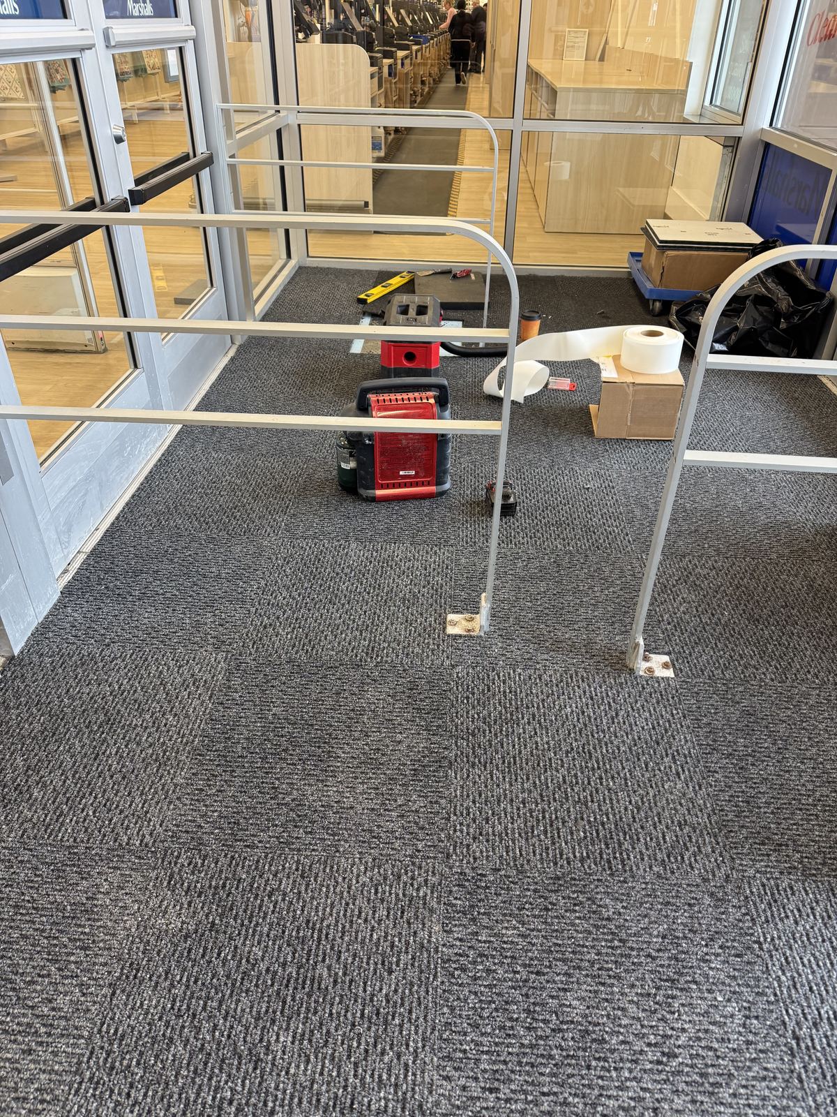 Store entryway with new carpet tile fully installed